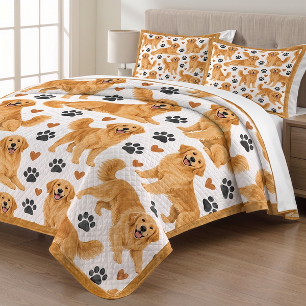 Golden Retriever Paw Print quilt set with two matching pillow shams on a made bed