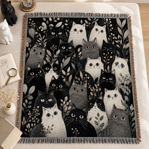 Moonlit Cat Gathering Woven Throw Blanket on a made bed