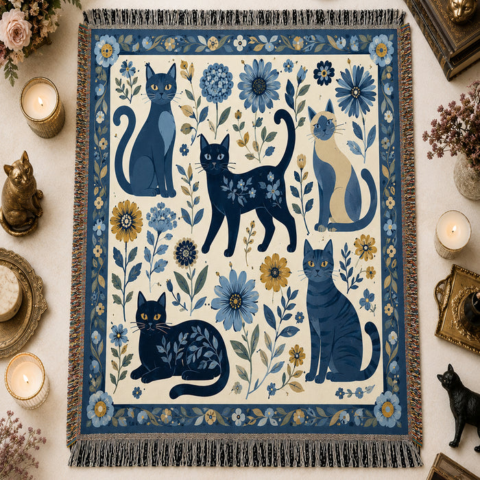 Indigo Bloom Cat Woven Throw Blanket on a made bed