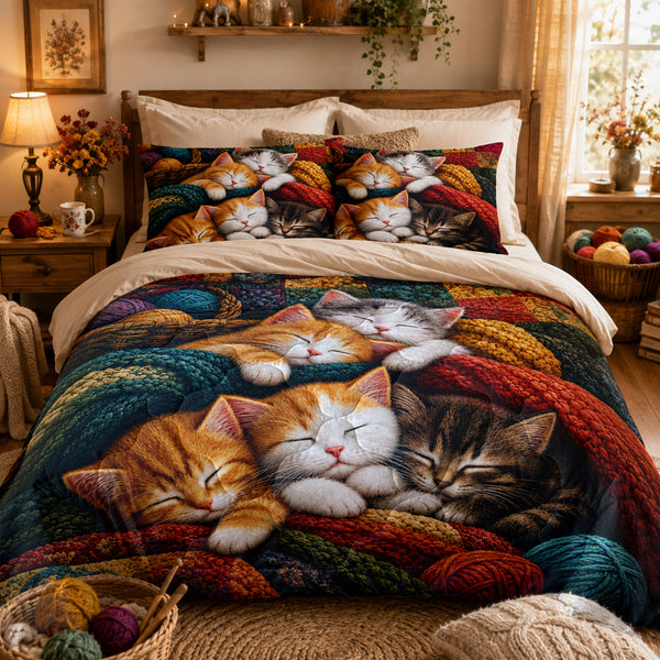 Sleepy Yarn Kittens Comforter Set on a made bed