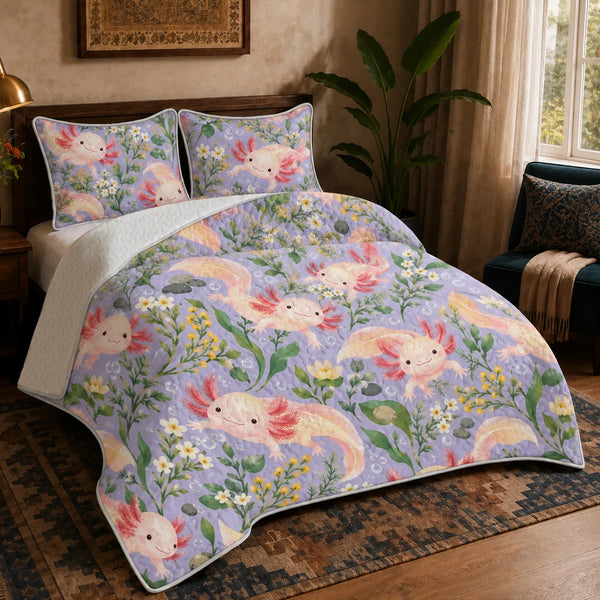 Spring Lilac Axolotl quilt set — peach-pink axolotls with white and yellow wildflowers and green leaves on lilac