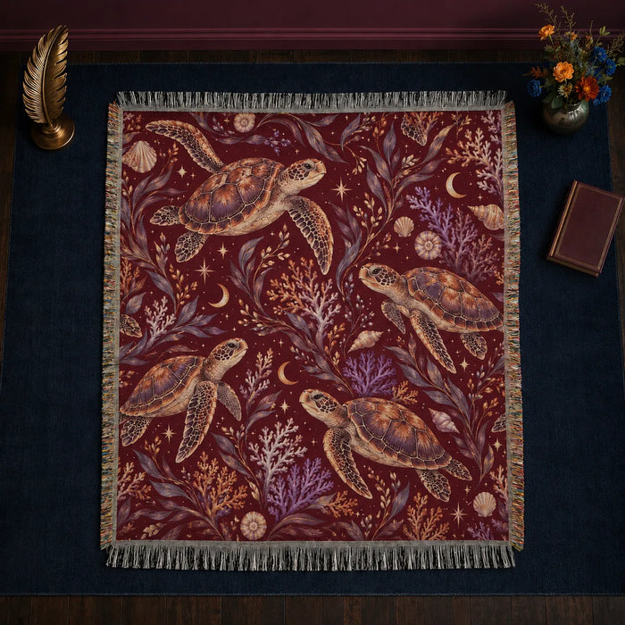 Burgundy Night Sea Turtle woven throw blanket — copper sea turtles with purple coral, shells, crescent moons and stars on deep burgundy