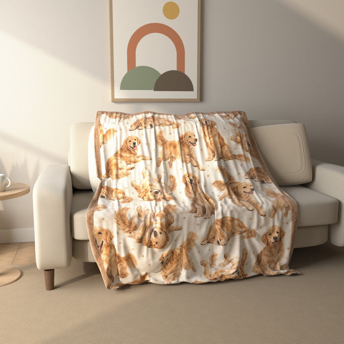 Playful Golden Retriever fleece throw blanket draped over a sofa
