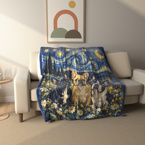 Starry Night French Bulldogs fleece throw blanket draped over a sofa