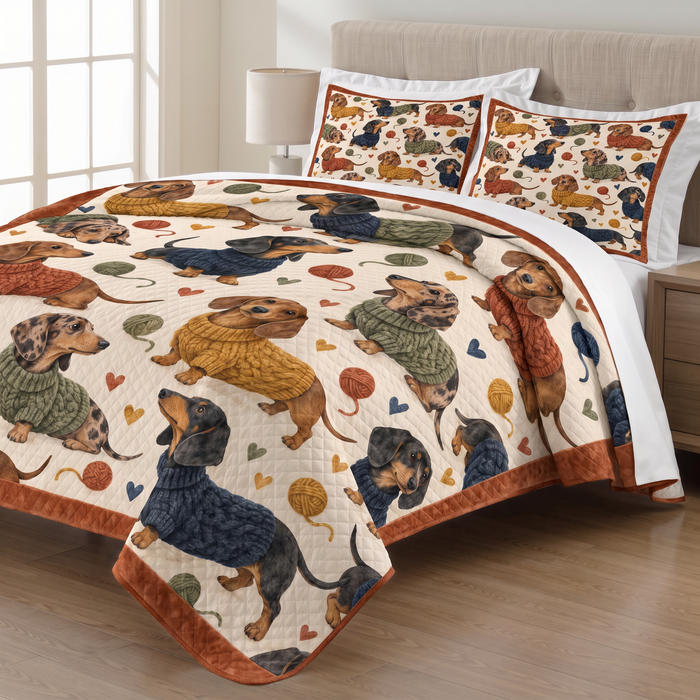 Sweater Dachshund Toss quilt set with two matching pillow shams on a made bed