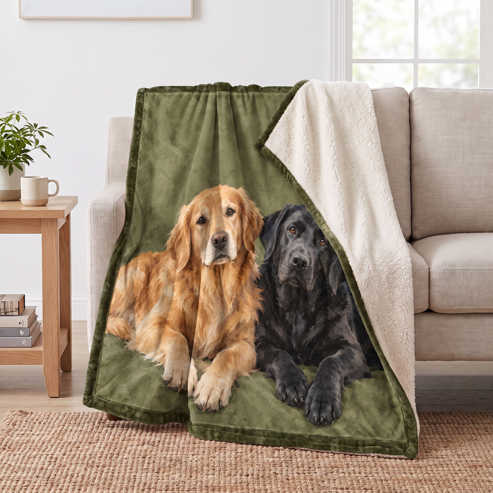 Golden Retriever & Black Lab Duo sherpa blanket draped over a sofa, corner folded back to show the cream sherpa reverse