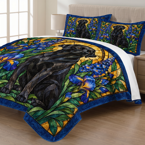 Stained Glass Black Labrador quilt set with two matching pillow shams on a made bed