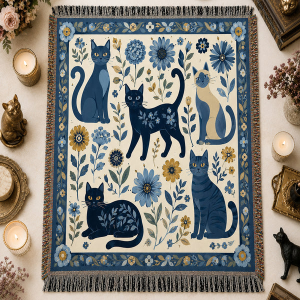Indigo Bloom Cat Woven Throw Blanket on a made bed