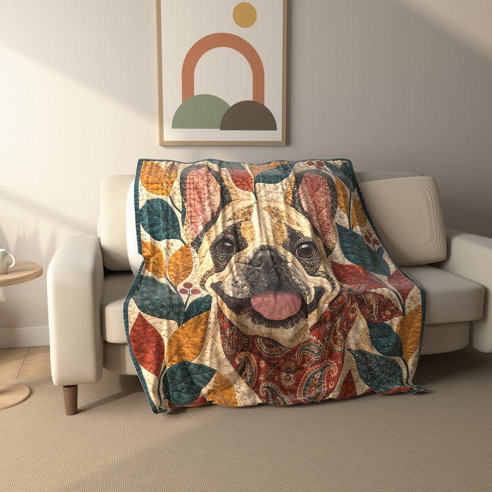 Folk Patchwork French Bulldog fleece throw blanket draped over a sofa