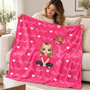 Woman holding the My Angel personalised name blanket in a bright living room