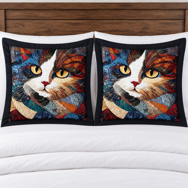 Patchwork Calico Portrait pillow shams – set of two flanged shams against a wooden headboard