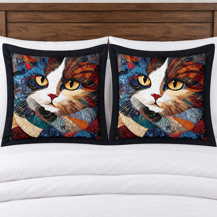 Patchwork Calico Portrait pillow shams – set of two flanged shams against a wooden headboard