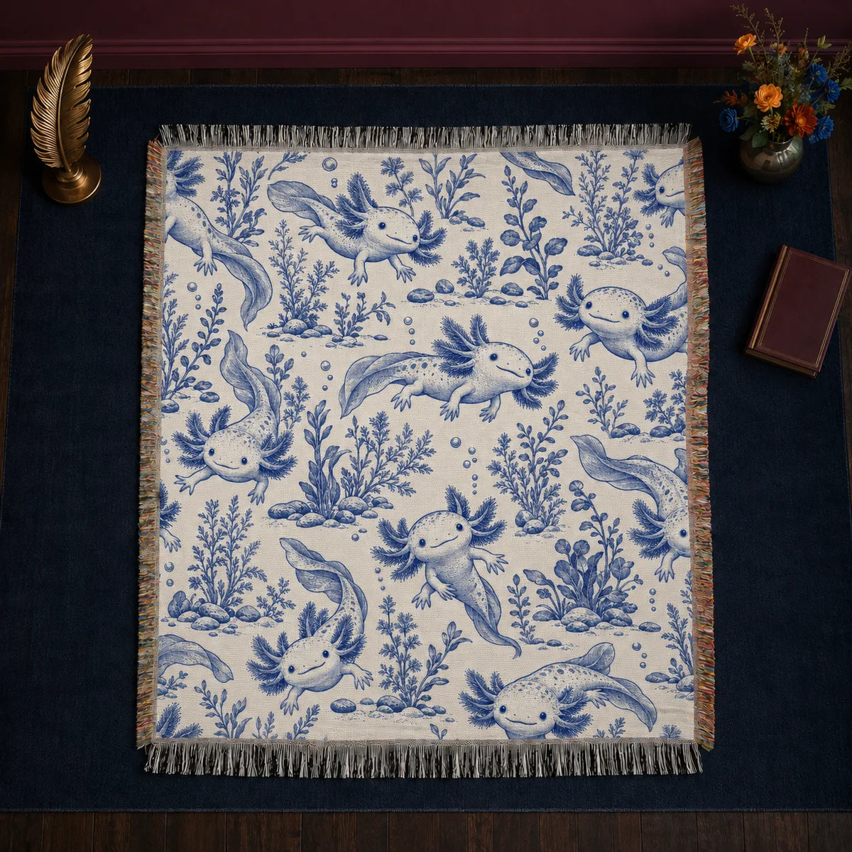 Blue Toile Axolotl woven throw blanket — blue toile axolotls among water plants, river stones and bubbles on cream