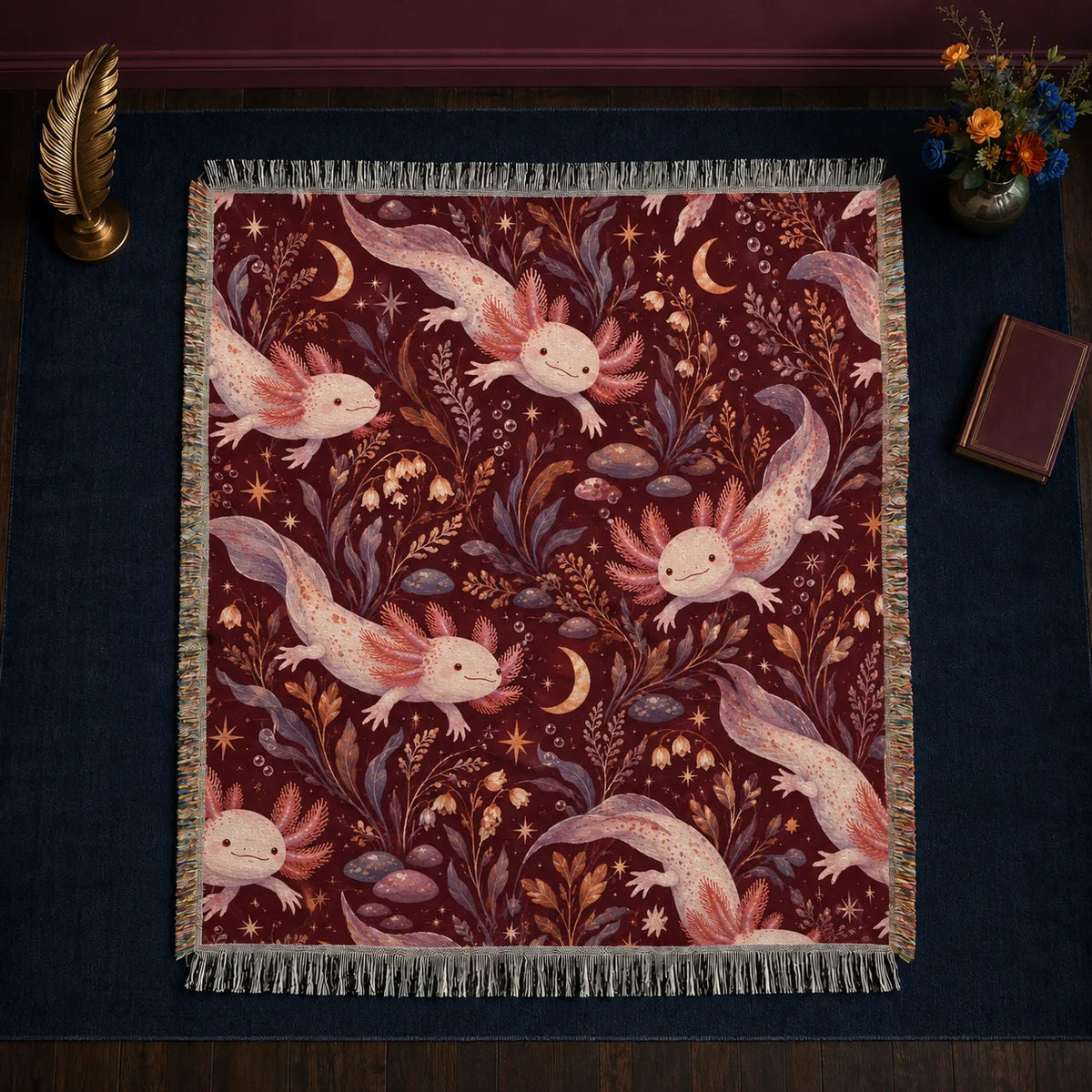 Burgundy Night Axolotl woven throw blanket — pink axolotls with gold crescent moons, stars and mauve leaves on deep burgundy