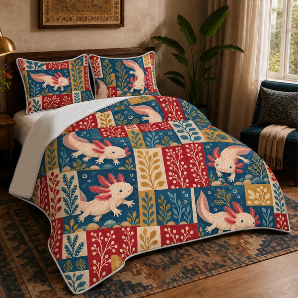 Heirloom Patchwork Axolotl quilt set — cream axolotls over patchwork squares of blue, red and mustard folk sprigs