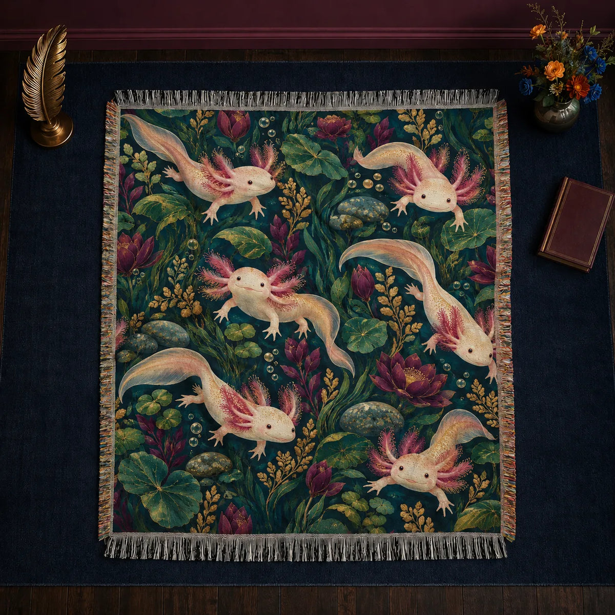 Jewel Botanical Axolotl woven throw blanket — cream axolotls among plum water lilies, lily pads and gold sprigs on deep teal green