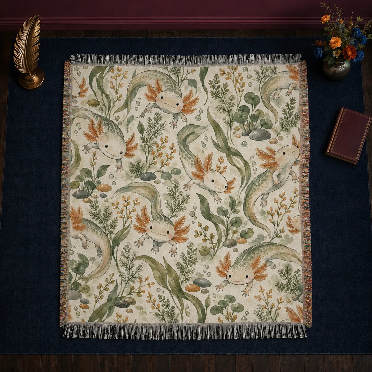 Sage Ink Wash Axolotl woven throw blanket — pale axolotls with copper gills among sage seaweed, fern sprigs and pebbles on cream