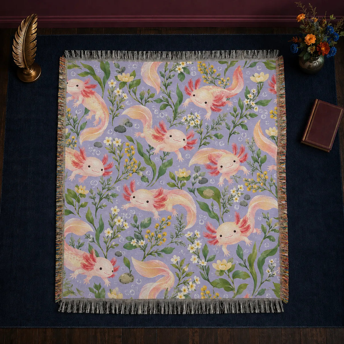 Spring Lilac Axolotl woven throw blanket — peach-pink axolotls with white and yellow wildflowers and green leaves on lilac