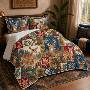Heirloom Patchwork Deer quilt set — deer and fawns in navy, red, mustard and cream patchwork blocks with ferns and pinecones