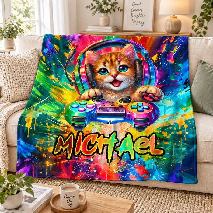 Neon gamer kitten name blanket with headphones and a controller, on a sofa