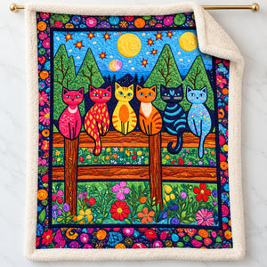 Garden Fence Cats sherpa blanket – smooth printed flannel front with plush cream sherpa back, hanging on a gold rod