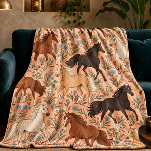Whimsical Contour Horse fleece throw blanket — outlined chestnut, black and palomino horses among dusty blue flowers on peach