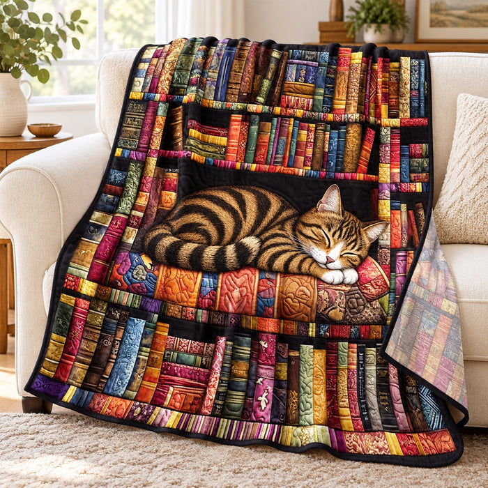 Library Nap Tabby Cat fleece throw blanket – lightweight printed fleece draped over a cream sofa