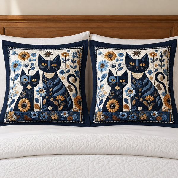 Navy Daisy Cats pillow shams – two navy-flanged shams standing against a wooden headboard