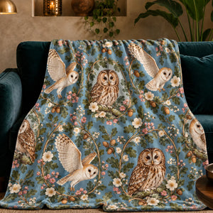 Botanical Medallions Owl fleece throw blanket — tawny owls in oak and pink blossom wreaths with flying barn owls on dusty blue