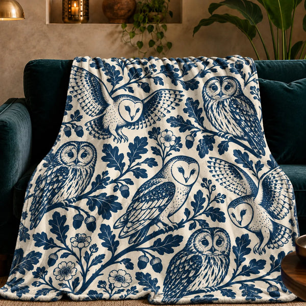 Indigo Block Print Owl fleece throw blanket — indigo barn owls and tawny owls among bold oak leaves and acorns on cream