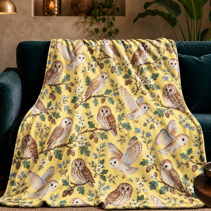 Tiny Ditsy Owl fleece throw blanket — small barn and tawny owls with oak sprigs, acorns and blue flowers on buttery yellow