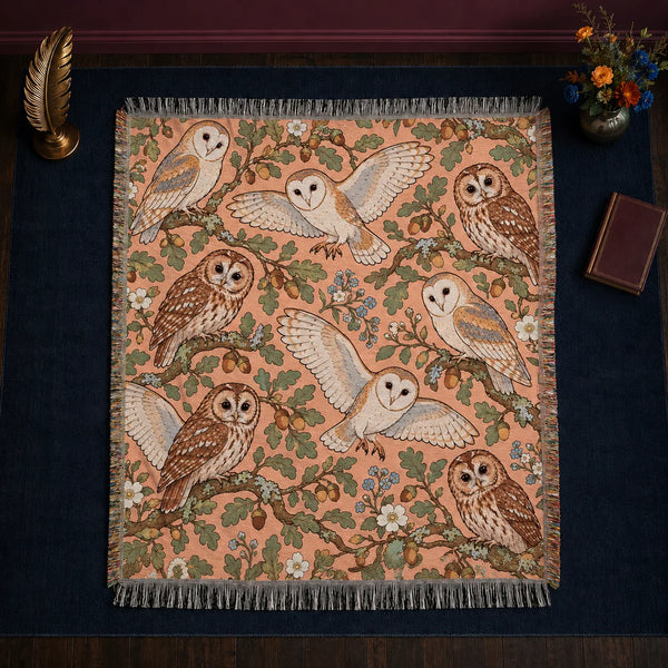 Whimsical Contour Owl woven throw blanket — outlined barn and tawny owls with sage oak leaves, acorns and blue flowers on peach