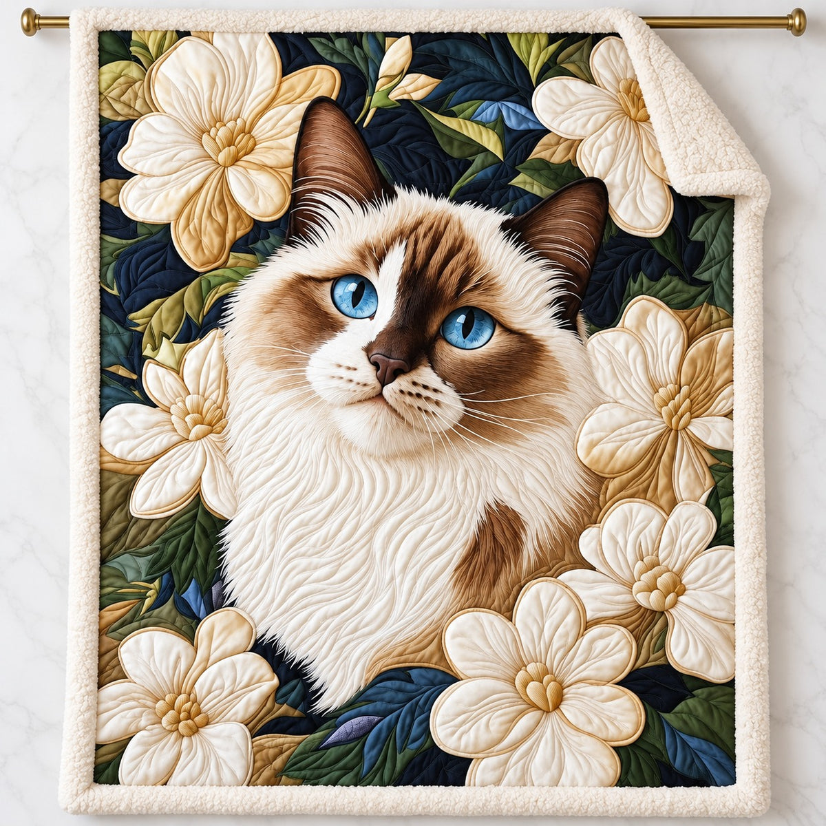 Ragdoll Blossom Cat sherpa blanket – smooth printed flannel front with plush cream sherpa back, hanging on a gold rod