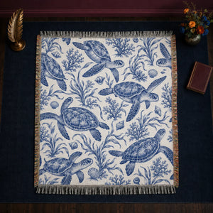 Blue Toile Sea Turtle woven throw blanket — cobalt blue engraved sea turtles with coral, seaweed and shells on white
