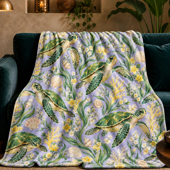 Spring Lilac Sea Turtle fleece throw blanket — green sea turtles among yellow and white blossoms, seagrass and pale coral on lilac