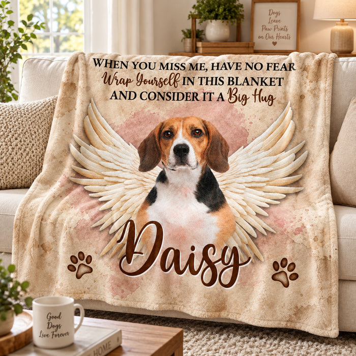 Soft wings pet memorial blanket in blush with photo and name, on a sofa