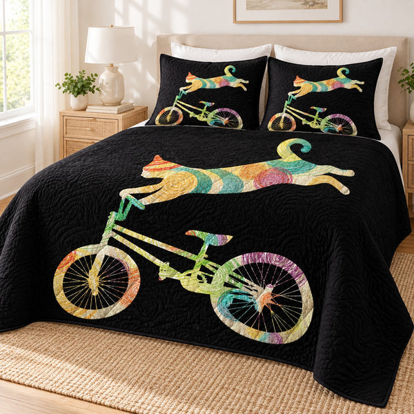 Rainbow Cycling Cat quilt set – quilt and two matching shams on a queen bed in a bright neutral bedroom